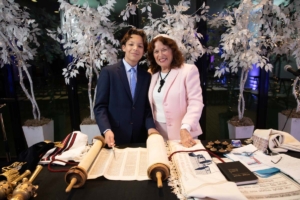 Boy in suit with adult female for bar mitzvah - Evan Guston Photography